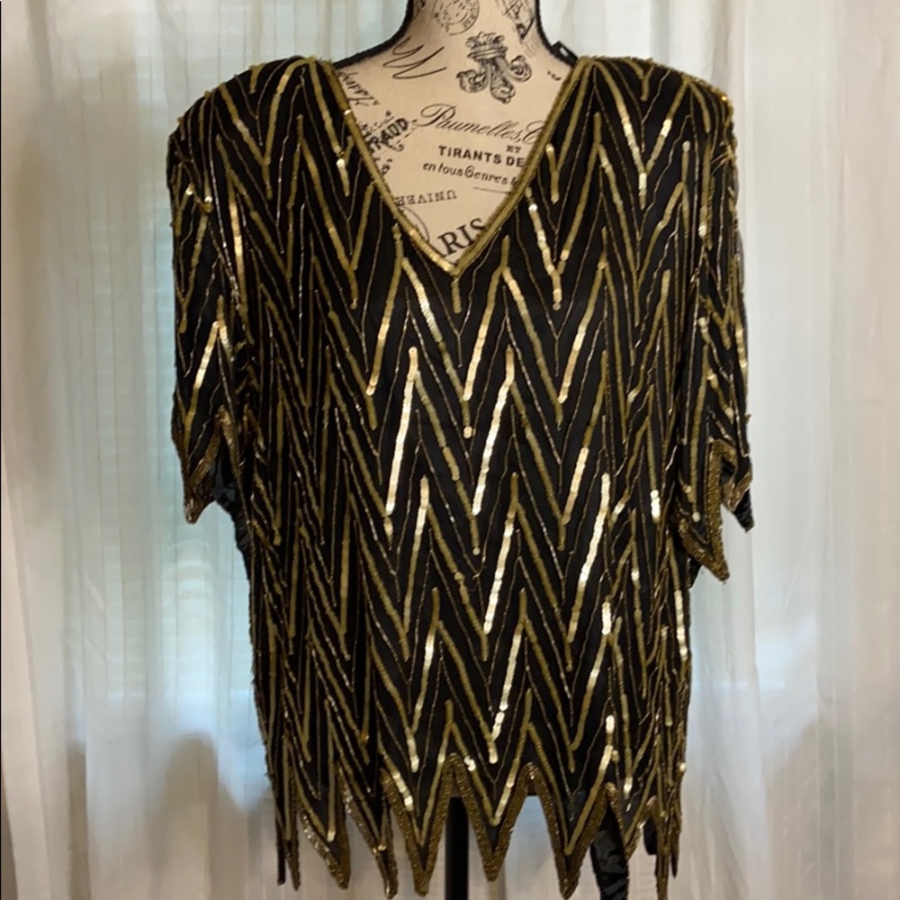 Snazzy top—never worn—size 2x (small for a 2x)
